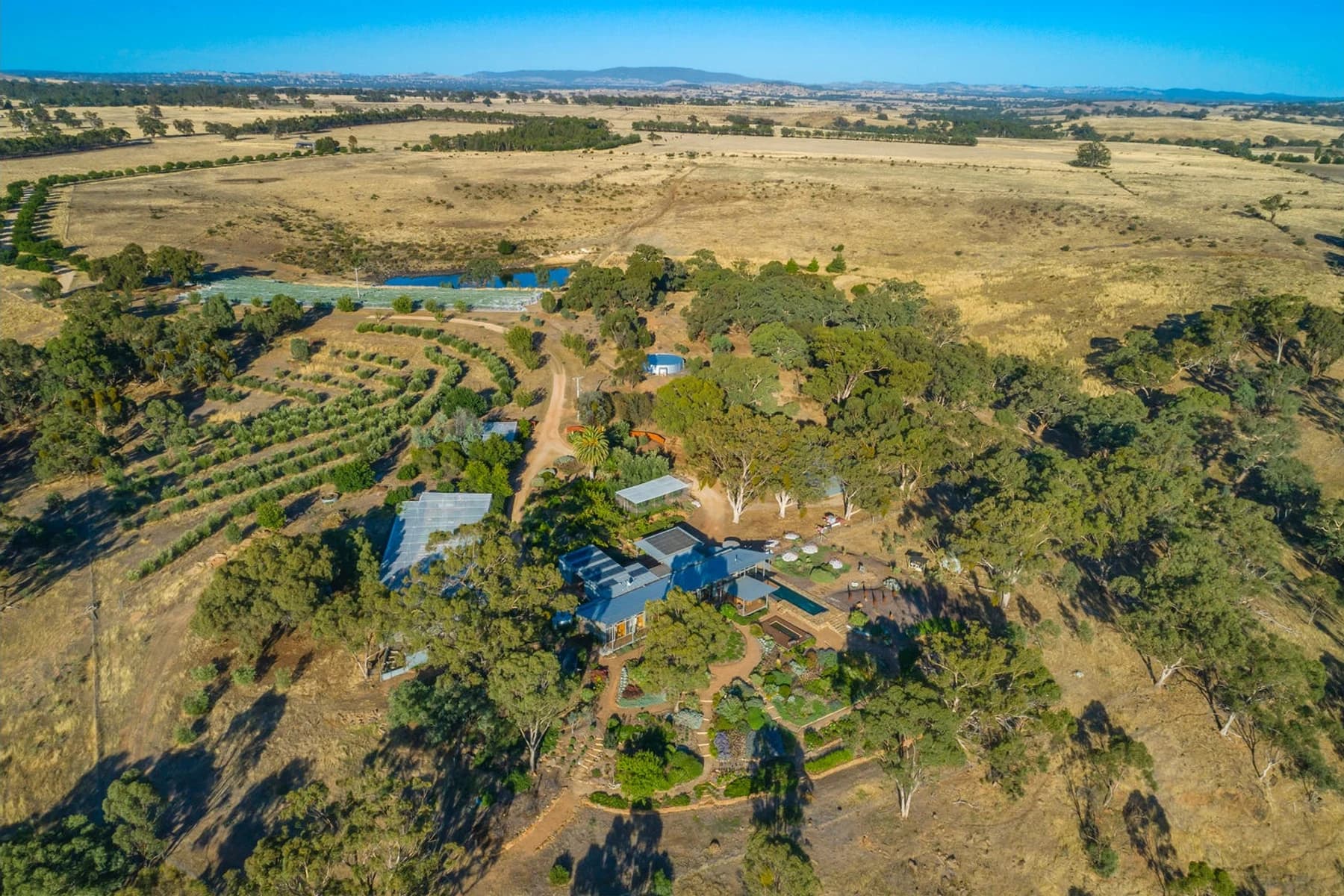Stone Axe gardens, productive country and the Main House viewed from above