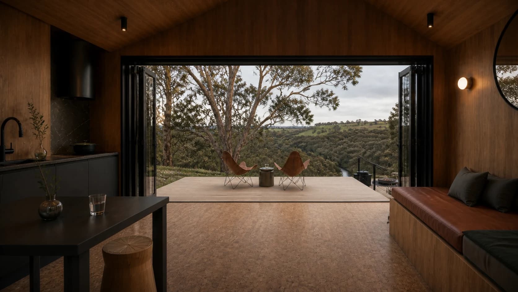 Concept rendering of the Tiny House Two living area opening onto the main deck and valley view