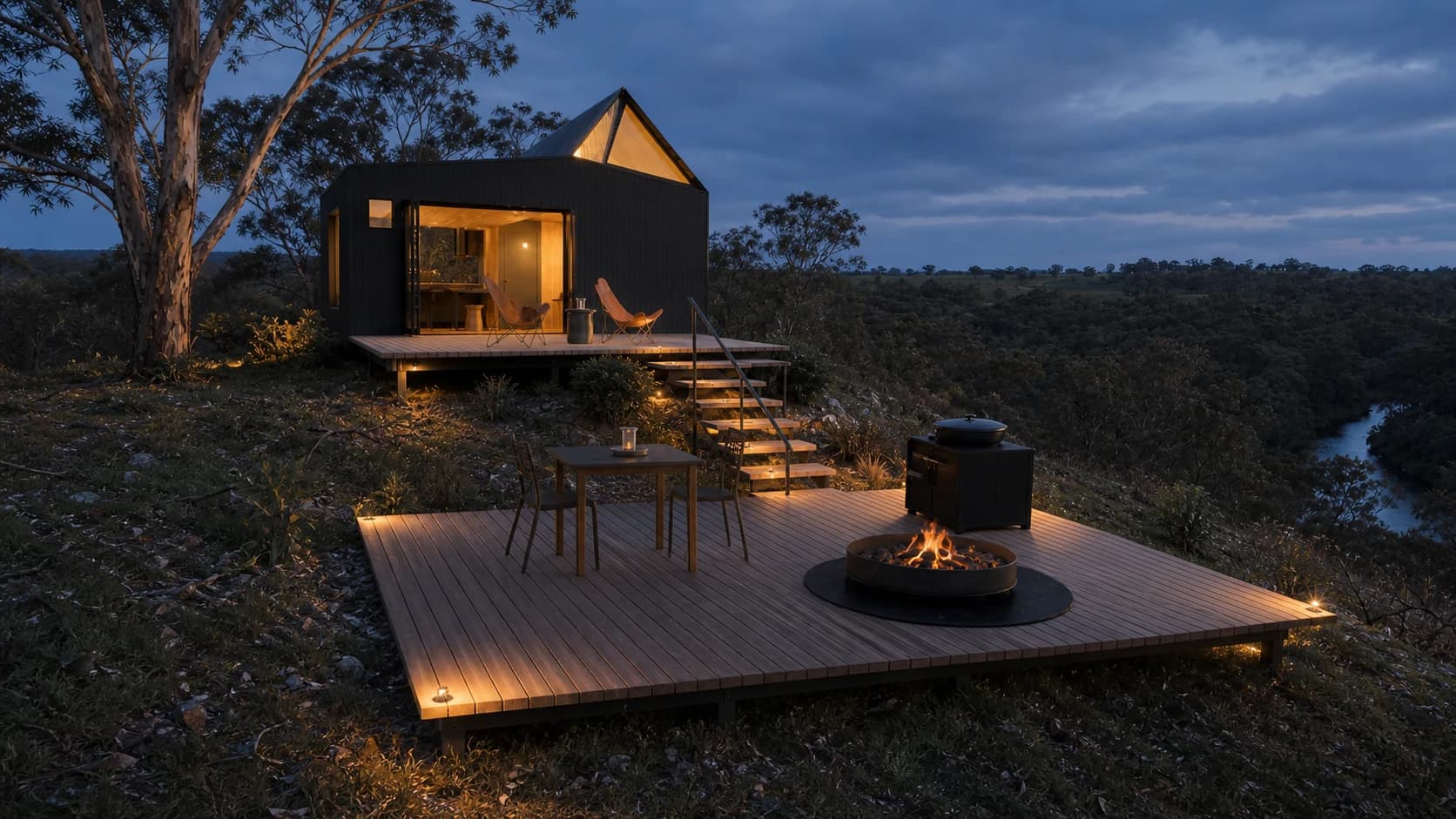 Concept rendering of Tiny House Two and both decks illuminated at dusk